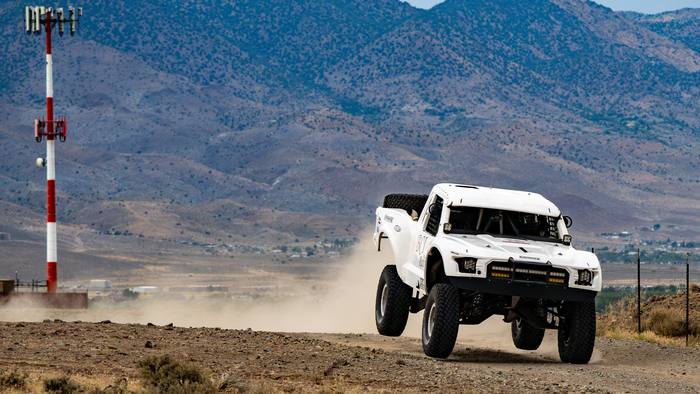 Unlimited Truck (2WD) race vehicle number 1 at speed, John Bowers