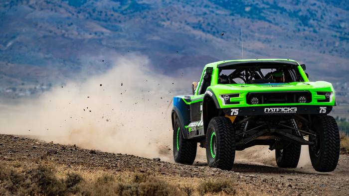 Unlimited Truck (2WD) race vehicle number 75 at speed, Jordan Dean