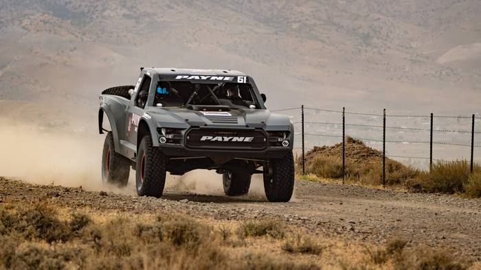 Unlimited Truck (2WD) race vehicle number 61 at speed, David Payne
